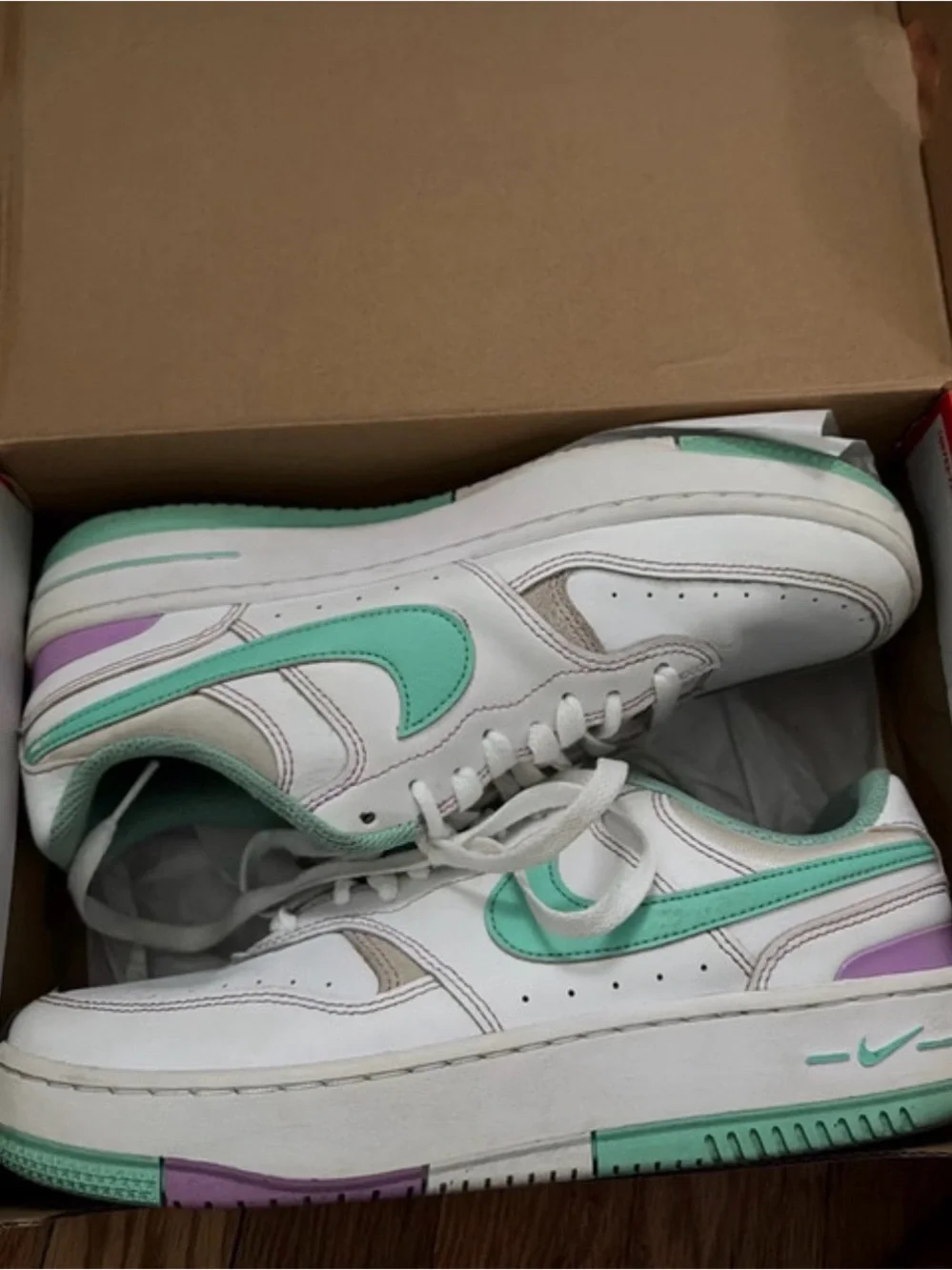 Nike Women's White Sneakers with Mint and Lavender Accents